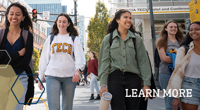 Students walking on campus. Links to information for for Prospective Students.