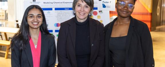 Students Diya Godavarti and Waynell Simbafo with Chemistry faculty Pamela Pollet
