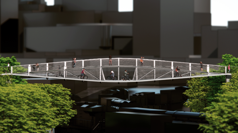 A rendering of the bridge illustrates the elevated pedestrian path and bike lanes over the rail lines.